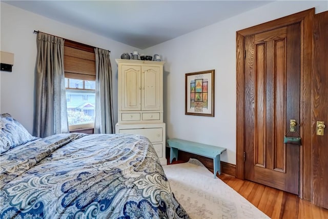 bedroom featuring light wood-type flooring