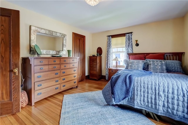 bedroom with light wood-style flooring