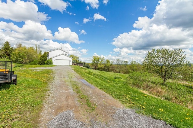 view of dirt / gravel driveway
