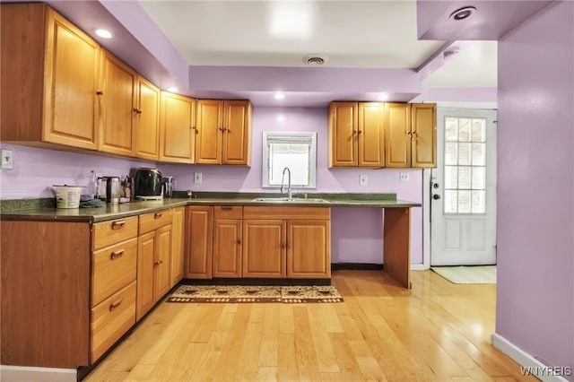 165 Breckenridge St, Buffalo, NY 14213 - kitchen with a sink, light wood-style floors, dark countertops, healthy amount of natural light, and recessed lighting