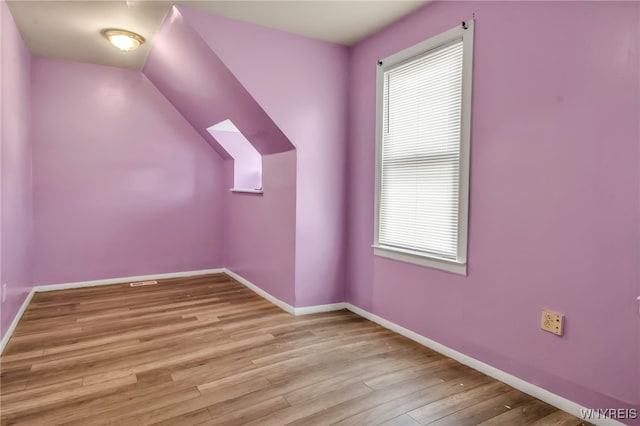 165 Breckenridge St, Buffalo, NY 14213 - bonus room featuring plenty of natural light, wood finished floors, baseboards, and lofted ceiling