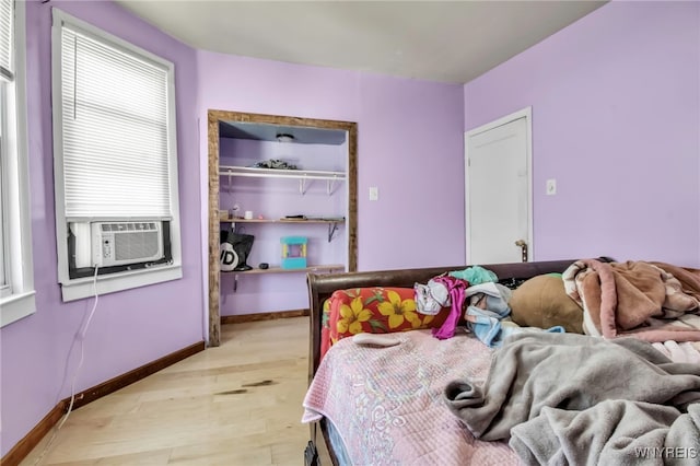 165 Breckenridge St, Buffalo, NY 14213 - bedroom featuring cooling unit, light wood-style flooring, and baseboards