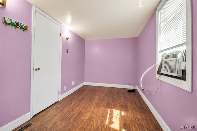 165 Breckenridge St, Buffalo, NY 14213 - additional living space featuring wood finished floors, baseboards, and cooling unit