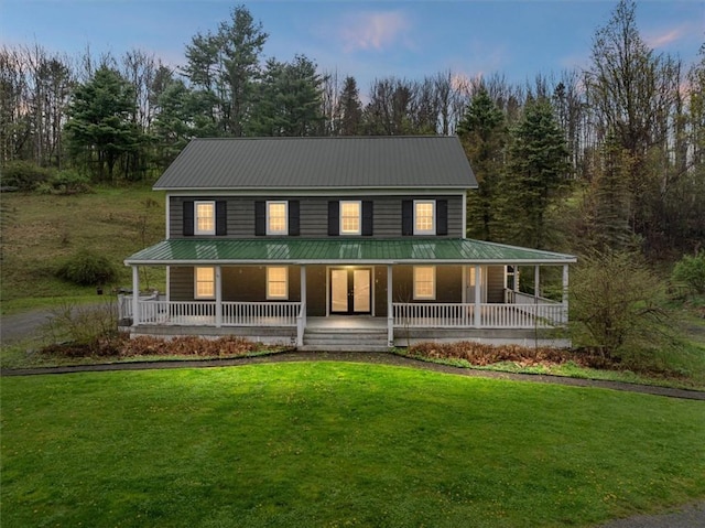 7471 State Highway 80, Springfield, NY 13326 - rear view of property featuring metal roof, covered porch, and a lawn