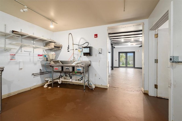 7471 State Highway 80, Springfield, NY 13326 - corridor featuring finished concrete flooring, baseboards, and french doors