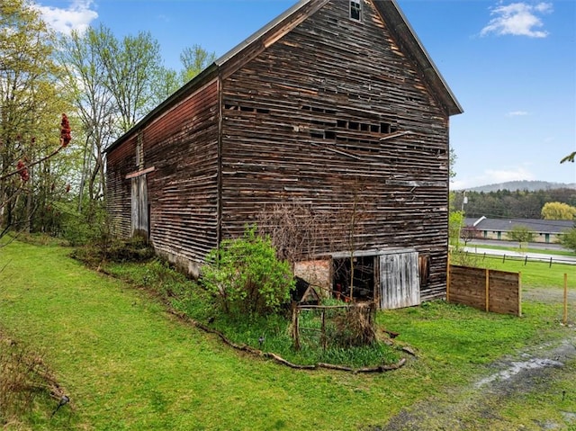 7471 State Highway 80, Springfield, NY 13326 - view of side of home with a barn and an outbuilding