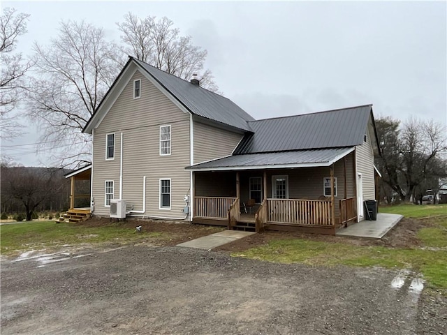 1940 State Highway 41, Coventry, NY 13733 - back of property featuring covered porch and metal roof