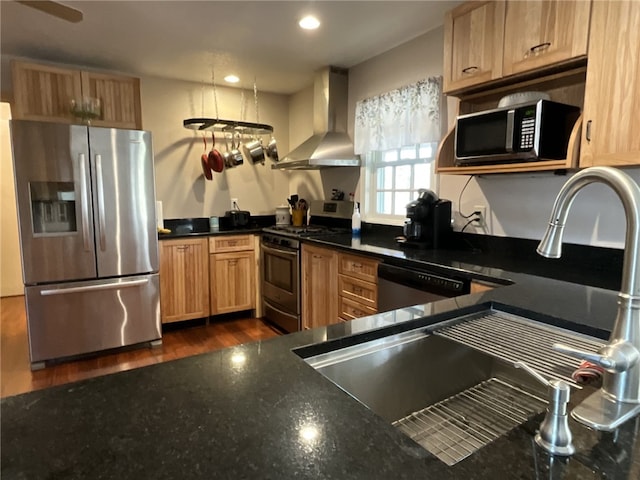 1940 State Highway 41, Coventry, NY 13733 - kitchen featuring stainless steel appliances, wall chimney range hood, dark wood-style flooring, a sink, and recessed lighting