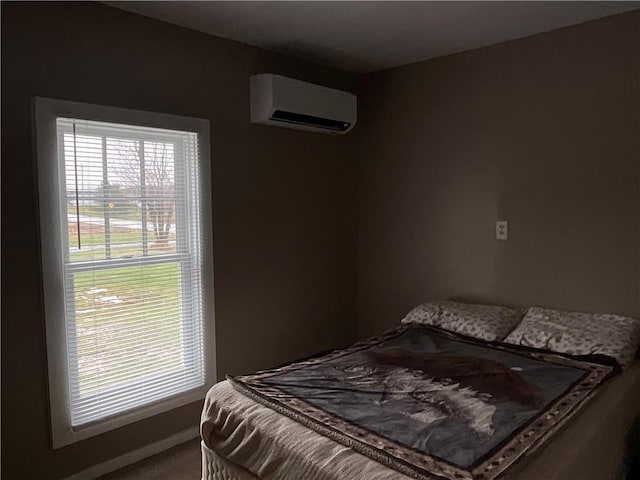 1940 State Highway 41, Coventry, NY 13733 - carpeted bedroom with a wall unit AC and baseboards