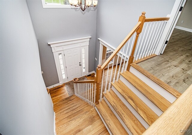 100 Brandywine Dr, Manlius, NY 13104 - entryway featuring a chandelier and wood finished floors