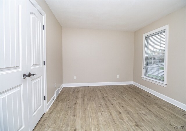 100 Brandywine Dr, Manlius, NY 13104 - unfurnished room featuring light wood finished floors and baseboards