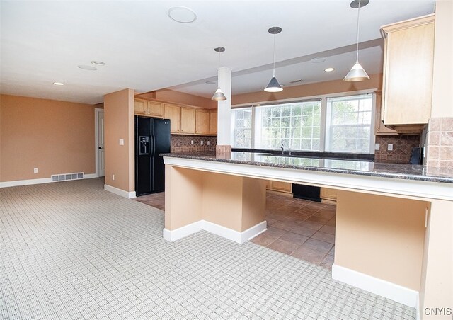 100 Brandywine Dr, Manlius, NY 13104 - kitchen featuring black fridge, light brown cabinetry, decorative backsplash, recessed lighting, and decorative light fixtures