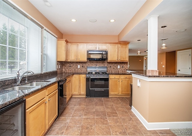 100 Brandywine Dr, Manlius, NY 13104 - kitchen featuring black appliances, beverage cooler, a sink, tasteful backsplash, and dark stone countertops