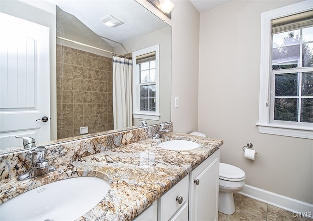 100 Brandywine Dr, Manlius, NY 13104 - full bathroom with toilet, double vanity, baseboards, a shower with shower curtain, and tile patterned floors