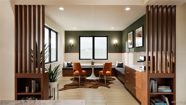 office area with wainscoting, light wood-type flooring, and recessed lighting
