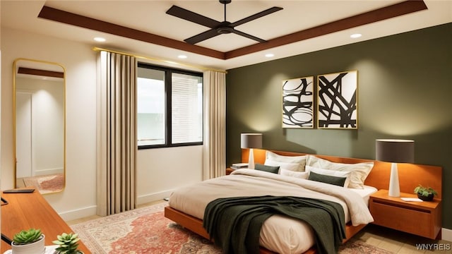 bedroom featuring recessed lighting, a raised ceiling, ceiling fan, and baseboards