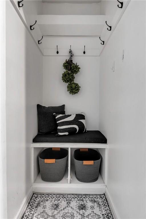 mudroom featuring baseboards