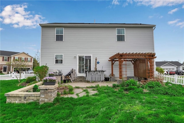 back of house featuring a pergola