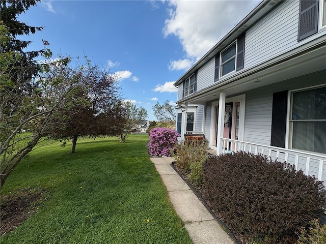 8 Hawkes Trl, Penfield, NY 14580 - view of grassy yard with a porch