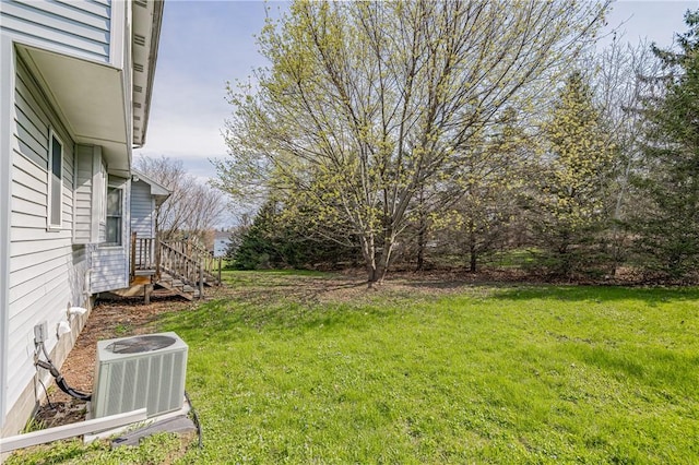 8 Hawkes Trl, Penfield, NY 14580 - view of grassy yard featuring cooling unit