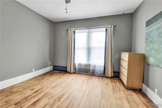 empty room featuring light wood finished floors