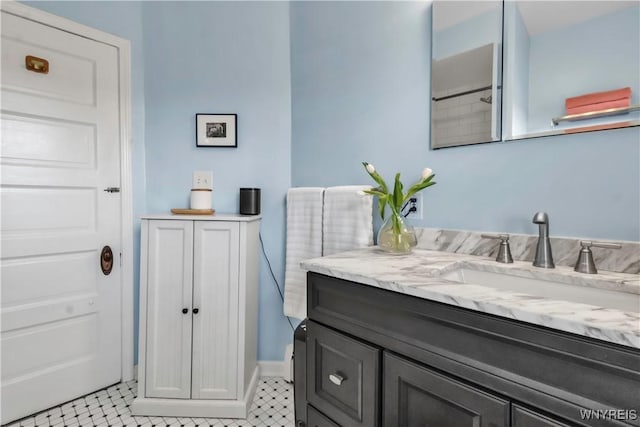 bathroom featuring vanity and tile patterned flooring