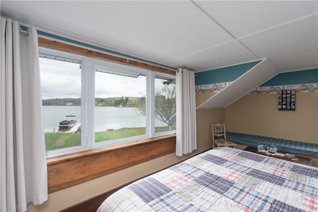 bedroom featuring a water view and vaulted ceiling