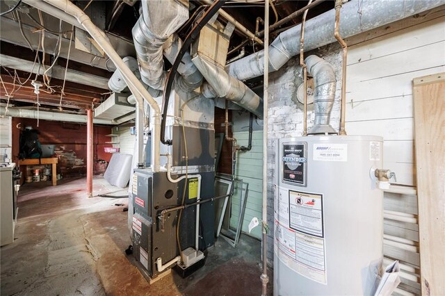 45 Juniper St, Rochester, NY 14610 - utility room featuring water heater and heating unit