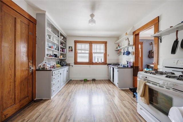 45 Juniper St, Rochester, NY 14610 - kitchen with gas range gas stove, open shelves, and light wood-style floors