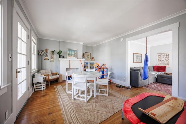 45 Juniper St, Rochester, NY 14610 - dining area featuring ornamental molding and wood finished floors