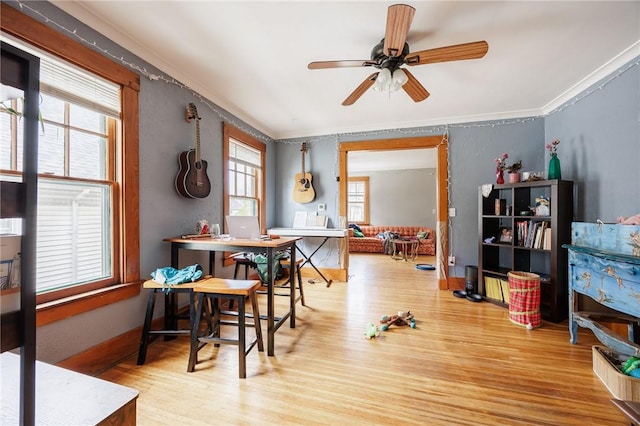 45 Juniper St, Rochester, NY 14610 - dining space featuring wood finished floors, a ceiling fan, ornamental molding, and baseboards
