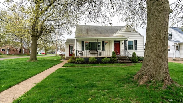 3556 Salisbury Ave, Hamburg, NY 14219 - view of front facade featuring covered porch and a front lawn
