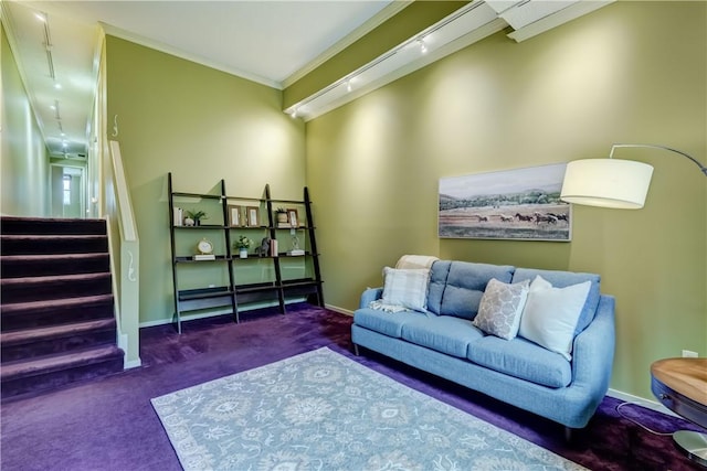 carpeted living room featuring crown molding and baseboards
