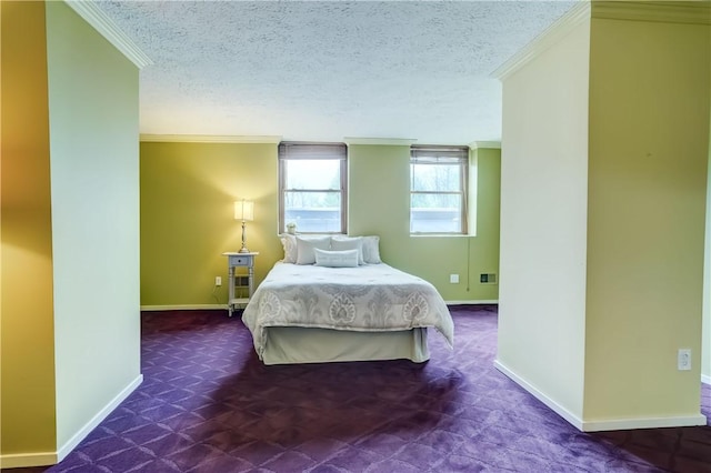 bedroom with carpet, ornamental molding, baseboards, and a textured ceiling