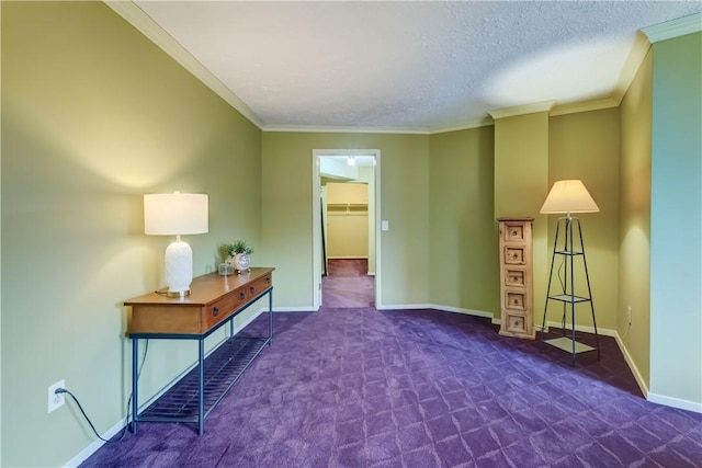 corridor featuring carpet, ornamental molding, baseboards, and a textured ceiling