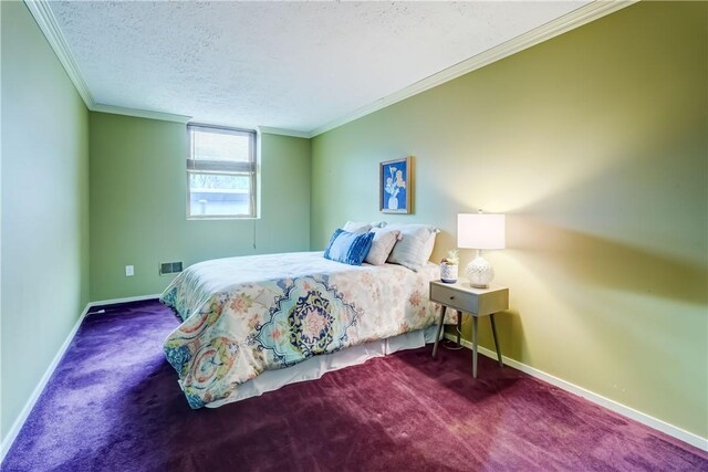 carpeted bedroom with baseboards, crown molding, and a textured ceiling