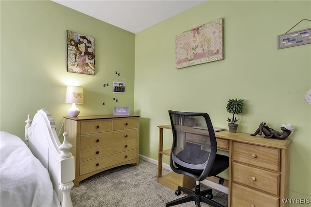 home office featuring carpet flooring and baseboards
