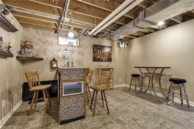 bar area with baseboards