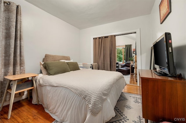 bedroom with light wood-type flooring