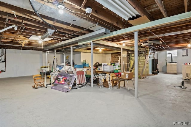 basement featuring gas water heater