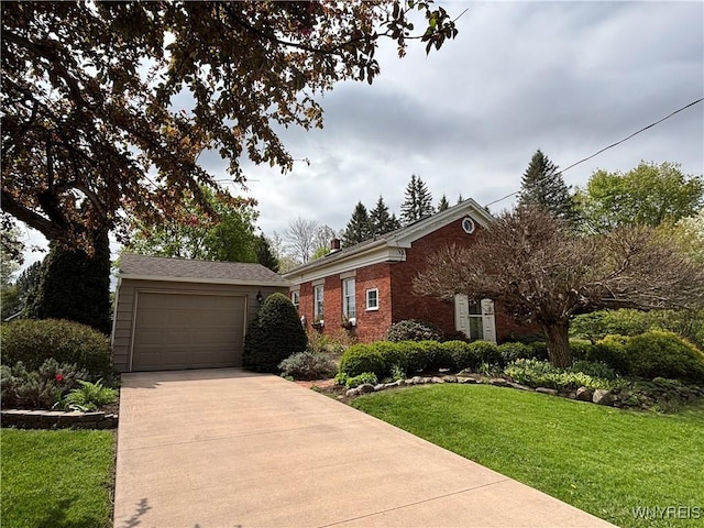 4450 Ridge Rd, Cambria, NY 14094 - view of front of home featuring a garage, brick siding, driveway, and a front yard