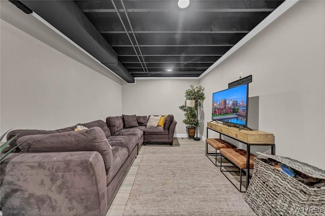 living room with wood finished floors and baseboards
