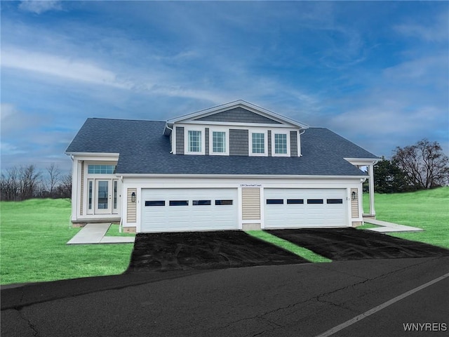 view of front of property featuring a front yard, driveway, a garage, and roof with shingles