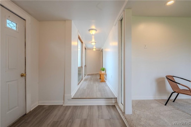 6043 Old Niagara Rd, Lockport Town, NY 14094 - hall with wood finished floors, baseboards, and recessed lighting
