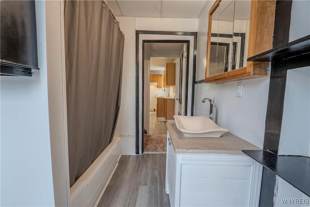 6043 Old Niagara Rd, Lockport Town, NY 14094 - washroom featuring a sink and wood finished floors