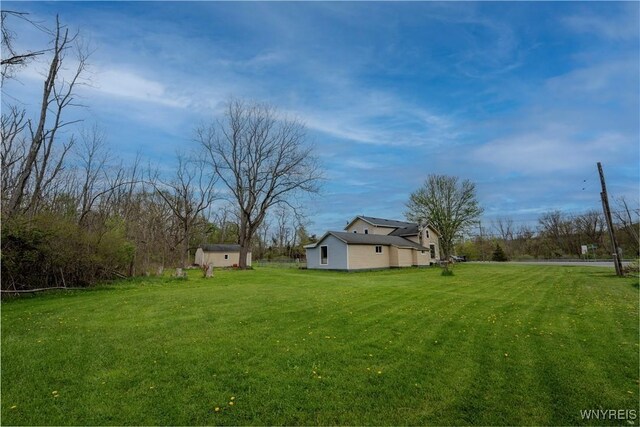 6043 Old Niagara Rd, Lockport Town, NY 14094 - view of green lawn with an outbuilding