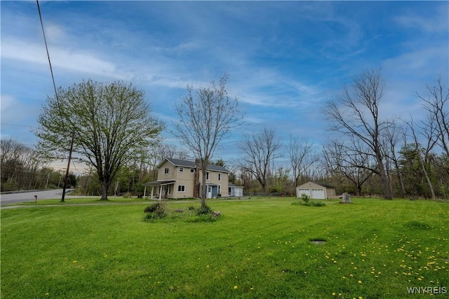 6043 Old Niagara Rd, Lockport Town, NY 14094 - view of grassy yard with an outdoor structure and a detached garage
