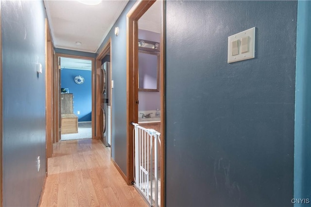 30204 County Route 179, Lyme, NY 13622 - hall featuring light wood finished floors and washer / clothes dryer