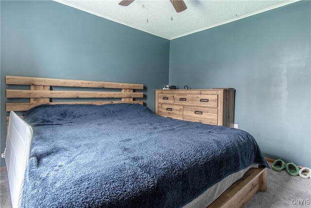 30204 County Route 179, Lyme, NY 13622 - carpeted bedroom featuring ornamental molding, a textured ceiling, ceiling fan, and baseboards
