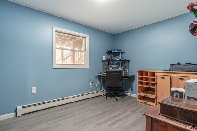 30204 County Route 179, Lyme, NY 13622 - office area with a baseboard heating unit, wood finished floors, and baseboards